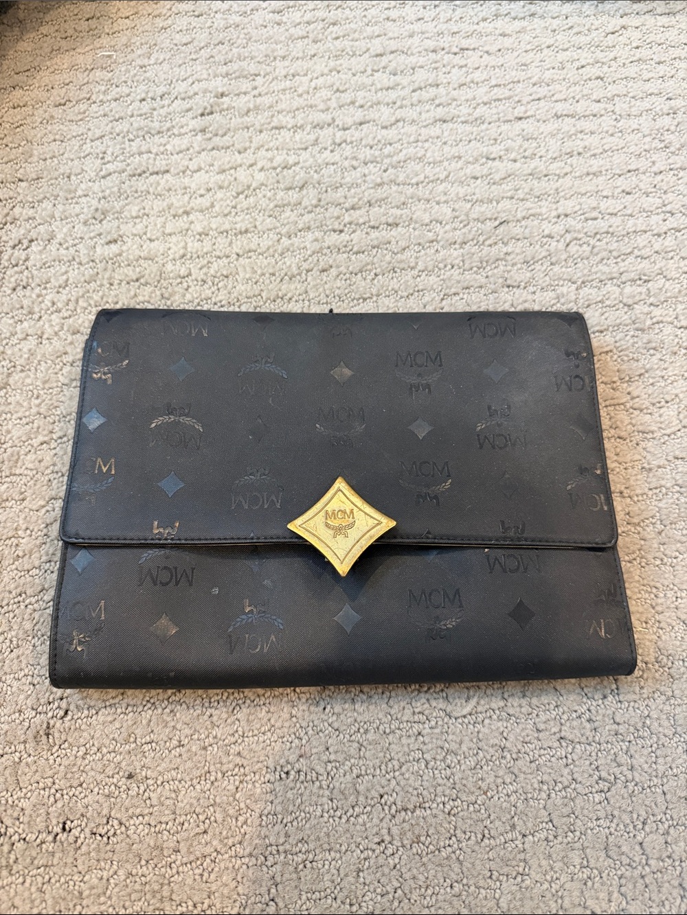MCM Black Monogram Envelope Clutch with Gold Emblem